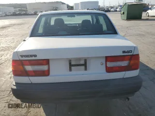 1994 Volvo 900 z VIN YV1JS8611R1172830, wystawiony jako Copart lot #75955284 z przebiegiem 222 846 mil mil oraz Szkody całkowita. Historia ofert i sprzedaży dostępna na DreamBid. Obrazek 6.