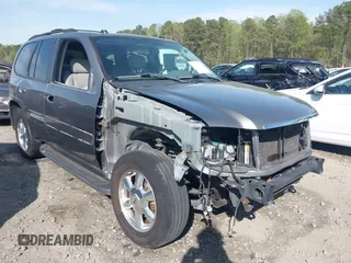 2005 GMC Envoy SLE with VIN 1GKDS13S452306939, listed as a IAAI auction lot 41931667 with 236,955 mi miles and . Bid and sale history available at DreamBid. Image 1.