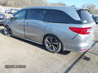 2018 Honda Odyssey Elite z VIN 5FNRL6H91JB070355, wystawiony jako IAAI lot #41975916 z przebiegiem 147 022 mil mil oraz . Historia ofert i sprzedaży dostępna na DreamBid. Obrazek 3.