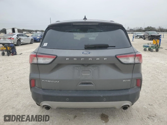 2021 Ford Escape Titanium with VIN 1FMCU9J9XMUA57500, listed as a Copart auction lot 46322915 with 67,101 mi miles and Salvage Title. Bid and sale history available at carsss.com. Image 6.