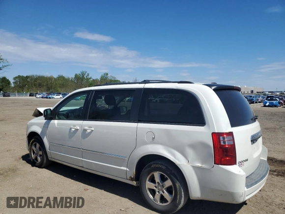 2009 Dodge Grand Caravan SXT z VIN 2D8HN54139R548082, wystawiony jako Copart lot #55882315 z przebiegiem 231 102 mil mil oraz Szkoda całkowita • Salvage title. Historia ofert i sprzedaży dostępna na DreamBid. Obrazek 2.