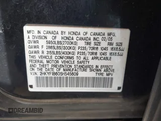 2005 Honda Pilot EX-L with RES with VIN 2HKYF18605H545609, listed as a IAAI auction lot 41626754 with 235,647 mi miles. Bid and sale history available at carsss.com. Image 9.