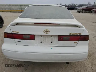 1998 Toyota Camry LE z VIN 4T1BF28K3WU068735, wystawiony jako Copart lot #44548355 z przebiegiem Nie podano mil oraz Szkoda całkowita • Salvage title. Historia ofert i sprzedaży dostępna na DreamBid. Obrazek 6.