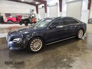 2014 Audi A8 4.0T with VIN WAUR2AFD8EN006198, listed as a Copart auction lot 85272544 with 105,058 mi miles and Salvage Title. Bid and sale history available at DreamBid. Image 1.