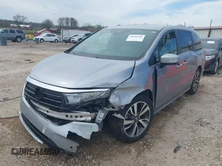 2021 Honda Odyssey Touring with VIN 5FNRL6H8XMB034837, listed as a IAAI auction lot 41856444 with 84,950 mi miles. Bid and sale history available at carsss.com. Image 17.