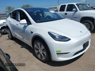2023 Tesla Model Y Long Range z VIN 7SAYGDEE1PF660444, wystawiony jako IAAI lot #42065046 z przebiegiem 23 601 mil mil oraz . Historia ofert i sprzedaży dostępna na DreamBid. Obrazek 1.