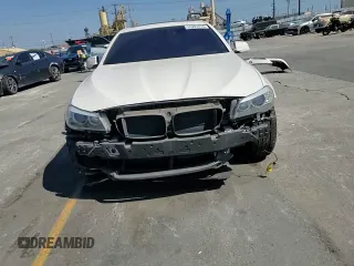 2012 BMW 5 Series 528i z VIN WBAXG5C57CDY30516, wystawiony jako Copart lot #55281415 z przebiegiem 97 908 mil mil oraz Szkoda całkowita • Salvage title. Historia ofert i sprzedaży dostępna na DreamBid. Obrazek 14.