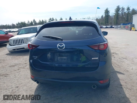 2018 Mazda CX-5 Touring z VIN JM3KFBCM4J0379871, wystawiony jako IAAI lot #41865130 z przebiegiem 48 674 mil mil oraz . Historia ofert i sprzedaży dostępna na DreamBid. Obrazek 17.