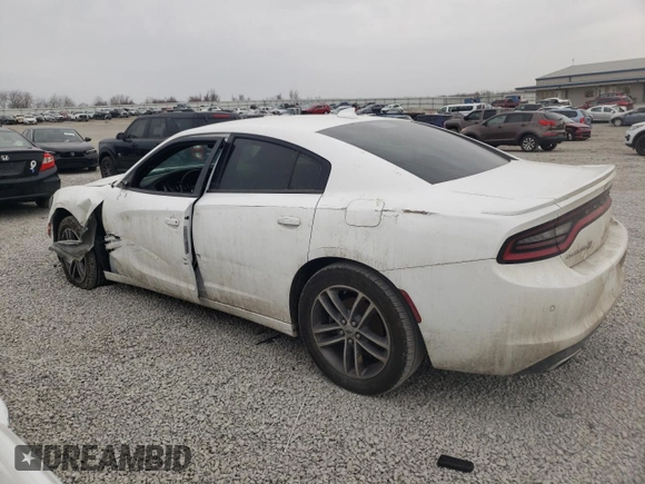 2019 Dodge Charger SXT with VIN 2C3CDXJG3KH758049, listed as a Copart auction lot 47238915 with 97,995 mi miles and Salvage Title. Bid and sale history available at DreamBid. Image 2.