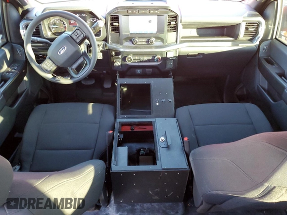 2023 Ford F-150 with VIN 1FTFW1P85PKD82406, listed as a Copart auction lot 84744944 with 32,982 mi miles and Salvage title. Bid and sale history available at DreamBid. Image 8.