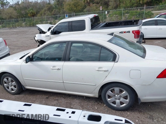 2009 Kia Optima LX z VIN KNAGE228395333286, wystawiony jako IAAI lot #41737577 z przebiegiem 113 152 mil mil oraz . Historia ofert i sprzedaży dostępna na DreamBid. Obrazek 14.