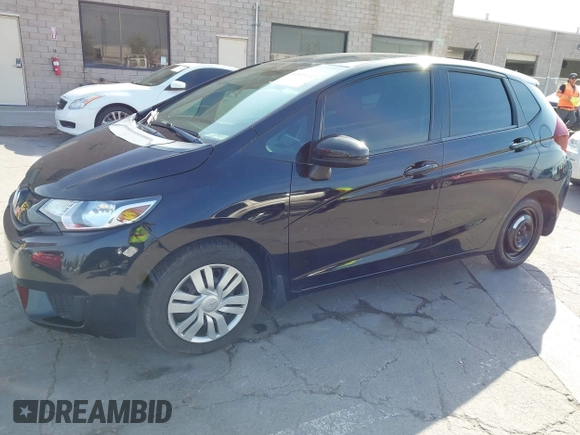 2015 Honda Fit LX with VIN 3HGGK5G5XFM737172, listed as a IAAI auction lot 42053332 with 80,690 mi miles. Bid and sale history available at carsss.com. Image 2.