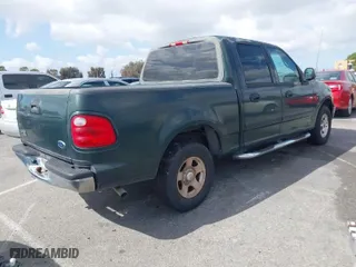 2001 Ford F-150 SuperCrew XLT with VIN 1FTRW07WX1KA43606, listed as a IAAI auction lot 41956736 with 278,543 mi miles. Bid and sale history available at carsss.com. Image 4.