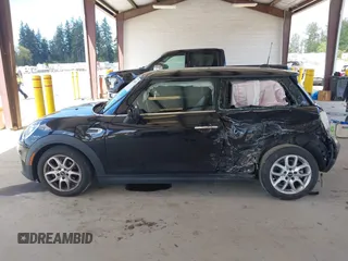 2021 MINI Hardtop Cooper with VIN WMWXR3C0XM2N93195, listed as a IAAI auction lot 42083421 with 46,269 mi miles and . Bid and sale history available at DreamBid. Image 14.
