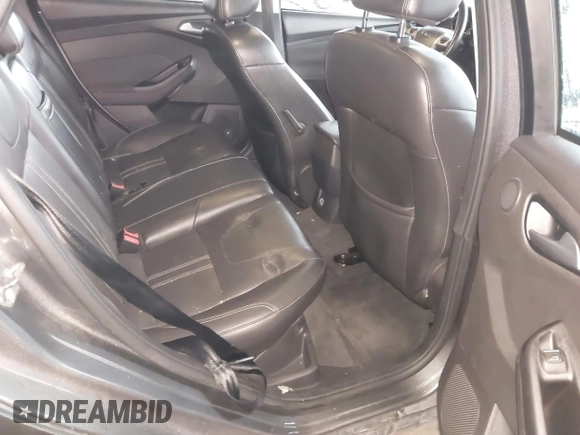 2013 Ford Focus Titanium with VIN 1FADP3J20DL189239, listed as a IAAI auction lot 42122324 with 116,917 mi miles and . Bid and sale history available at carsss.com. Image 8.