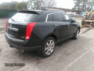 2012 Cadillac SRX Performance Collection z VIN 3GYFNBE39CS641892, wystawiony jako IAAI lot #41395695 z przebiegiem 95 303 mil mil oraz . Historia ofert i sprzedaży dostępna na DreamBid. Obrazek 4.