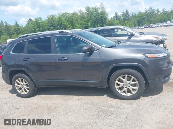 2016 Jeep Cherokee Latitude z VIN 1C4PJMCB4GW241454, wystawiony jako IAAI lot #42378181 z przebiegiem 210 207 mil mil oraz . Historia ofert i sprzedaży dostępna na DreamBid. Obrazek 13.