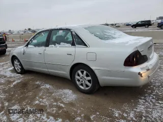 2001 Toyota Avalon XL z VIN 4T1BF28B01U138751, wystawiony jako Copart lot #44849165 z przebiegiem 225 082 mil mil oraz Tytuł czysty. Historia ofert i sprzedaży dostępna na DreamBid. Obrazek 2.