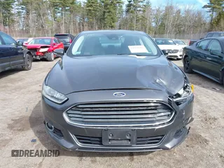2015 Ford Fusion Energi Titanium with VIN 3FA6P0SU0FR200963, listed as a IAAI auction lot 41897182 with 104,100 mi miles. Bid and sale history available at carsss.com. Image 13.