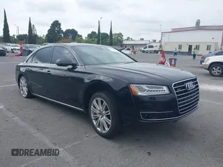 2015 Audi A8 L 4.0T with VIN WAU32AFD4FN033471, listed as a IAAI auction lot 42120112 with 174,882 mi miles. Bid and sale history available at carsss.com. Image 1.