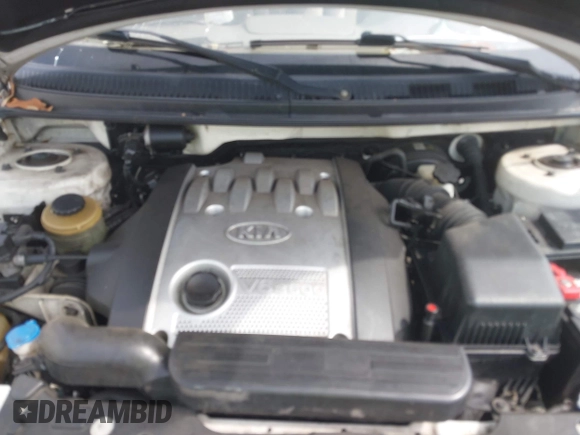 2005 Kia Sedona LX with VIN KNDUP132056702484, listed as a IAAI auction lot 42099572 with 195,528 mi miles and . Bid and sale history available at DreamBid. Image 10.