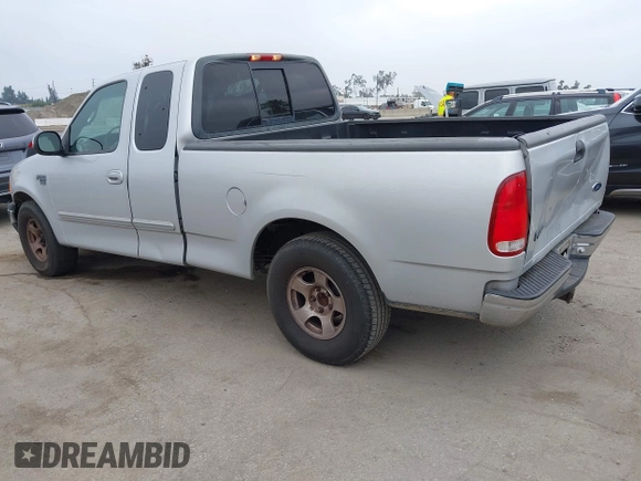 2000 Ford F-150 XL with VIN 1FTRX17W0YKA70861, listed as a IAAI auction lot 42096438 with 1 mi miles. Bid and sale history available at carsss.com. Image 3.