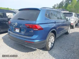 2018 Volkswagen Tiguan S with VIN 3VV0B7AXXJM018455, listed as a IAAI auction lot 41979115 with 92,104 mi miles. Bid and sale history available at carsss.com. Image 4.
