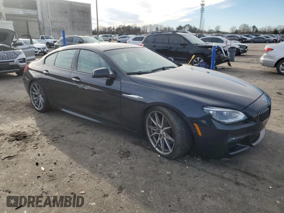 2014 BMW 6 Series 650i z VIN WBA6B2C51ED128896, wystawiony jako Copart lot #84801734 z przebiegiem 142 181 mil mil oraz Szkoda całkowita • Salvage title. Historia ofert i sprzedaży dostępna na DreamBid. Obrazek 4.