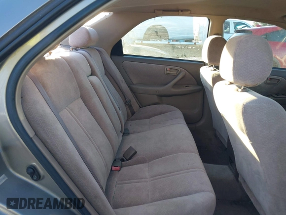 1997 Toyota Camry LE z VIN 4T1BG22K0VU019383, wystawiony jako IAAI lot #41271457 z przebiegiem 175 214 mil mil oraz . Historia ofert i sprzedaży dostępna na DreamBid. Obrazek 8.