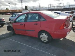 2001 Ford Focus LX with VIN 1FAFP33P91W151083, listed as a Copart auction lot 48943555 with 157,848 mi miles and Salvage Title. Bid and sale history available at carsss.com. Image 2.
