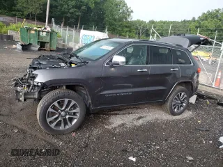 2017 Jeep Grand Cherokee Overland with VIN 1C4RJFCG4HC730861, listed as a Copart auction lot 62918825 with 77,228 mi miles and Salvage title. Bid and sale history available at DreamBid. Image 1.