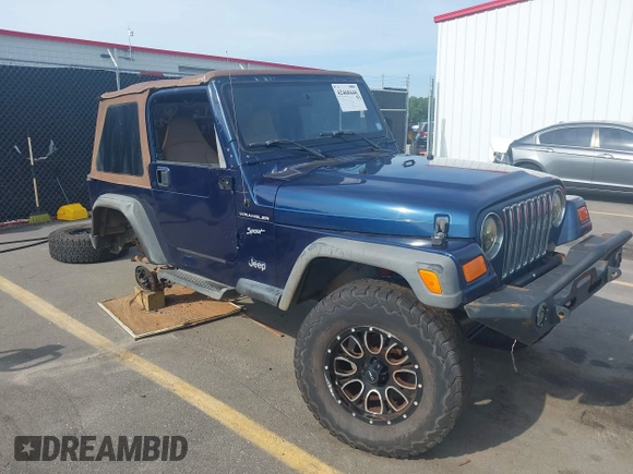 2002 Jeep Wrangler Sport with VIN 1J4FA49S72P729703, listed as a IAAI auction lot 42468446 with 164,342 mi miles and . Bid and sale history available at DreamBid. Image 1.