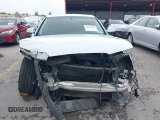2014 Audi A4 Premium Plus z VIN WAUFFAFL2EN021407, wystawiony jako IAAI lot #42418122 z przebiegiem 226 243 mil mil oraz . Historia ofert i sprzedaży dostępna na DreamBid. Obrazek 6.
