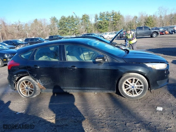 2015 Ford Focus SE with VIN 1FADP3K20FL213184, listed as a IAAI auction lot 41801065 with 151,824 mi miles. Bid and sale history available at carsss.com. Image 13.