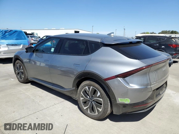 2022 Kia EV6 Wind with VIN KNDC3DLCXN5086669, listed as a Copart auction lot 68265344 with 74,711 mi miles and Salvage Title. Bid and sale history available at carsss.com. Image 2.