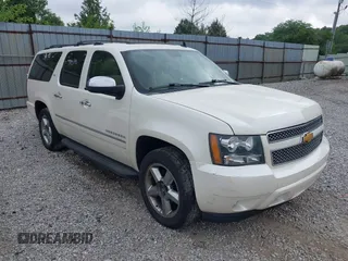 2014 Chevrolet Suburban LTZ with VIN 1GNSKKE79ER218727, listed as a IAAI auction lot 42761610 with 242,771 mi miles and . Bid and sale history available at DreamBid. Image 1.