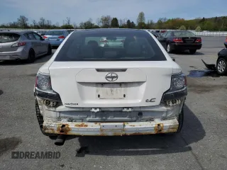 2014 Scion tC z VIN JTKJF5C70E3084697, wystawiony jako Copart lot #54307295 z przebiegiem 174 073 mil mil oraz Szkoda całkowita • Salvage title. Historia ofert i sprzedaży dostępna na DreamBid. Obrazek 6.