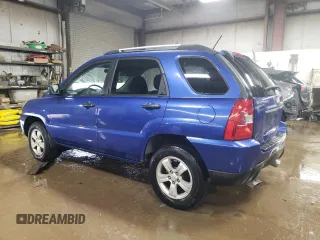 2009 Kia Sportage LX with VIN KNDJF724197557676, listed as a Copart auction lot 51774565 with 172,768 mi miles and Salvage Title. Bid and sale history available at carsss.com. Image 2.