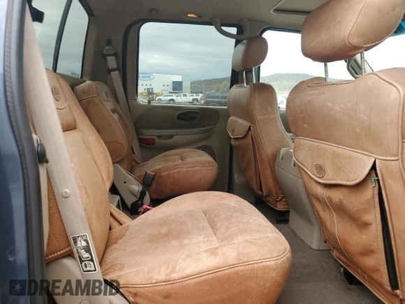 2001 Ford F-150 XLT with VIN 1FTRW07LX1KA18940, listed as a Copart auction lot 50723495 with 133,686 mi miles and Salvage title. Bid and sale history available at DreamBid. Image 10.