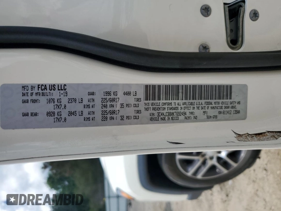 2019 Jeep Compass Altitude with VIN 3C4NJCBB0KT692494, listed as a Copart auction lot 60972975 with 75,517 mi miles and Salvage title. Bid and sale history available at DreamBid. Image 14.