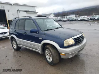 2003 Suzuki Grand Vitara with VIN JS3TD62V134105917, listed as a IAAI auction lot 41415963 with 87,548 mi miles. Bid and sale history available at carsss.com. Image 1.