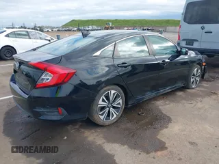 2016 Honda Civic Sedan EX-L with VIN 19XFC1F78GE201822, listed as a IAAI auction lot 41882529 with 142,589 mi miles. Bid and sale history available at carsss.com. Image 4.