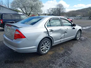 2010 Ford Fusion SEL with VIN 3FAHP0JA8AR430825, listed as a IAAI auction lot 41964707 with 139,144 mi miles. Bid and sale history available at carsss.com. Image 4.