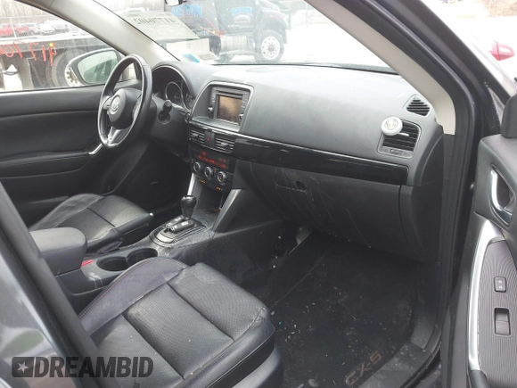 2014 Mazda CX-5 Grand Touring with VIN JM3KE4DY4E0343863, listed as a IAAI auction lot 41770402 with 117,615 mi miles. Bid and sale history available at carsss.com. Image 5.