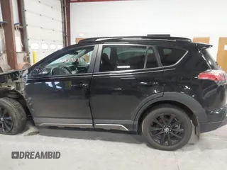 2018 Toyota RAV4 XLE with VIN 2T3RFREV0JW715761, listed as a IAAI auction lot 41881863 with 67,534 mi miles and . Bid and sale history available at DreamBid. Image 14.