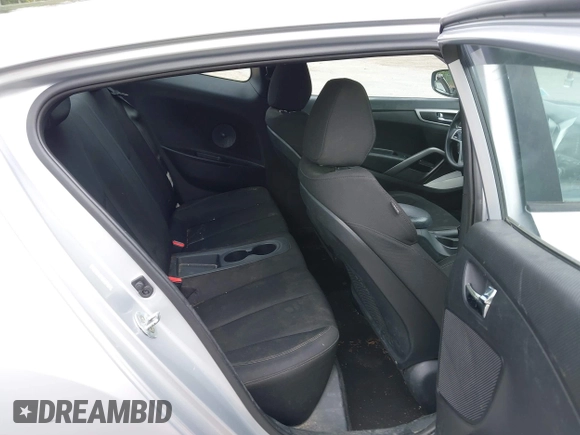 2016 Hyundai Veloster z VIN KMHTC6AD2GU277109, wystawiony jako IAAI lot #42312969 z przebiegiem 132 899 mil mil oraz . Historia ofert i sprzedaży dostępna na DreamBid. Obrazek 8.