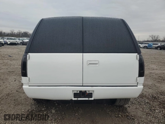 1997 GMC Yukon with VIN 3GKEC18R0VG523581, listed as a Copart auction lot 79601454 with 184,548 mi miles and Salvage Title. Bid and sale history available at carsss.com. Image 6.