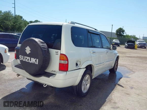 2003 Suzuki XL-7 Touring with VIN JS3TX92V934104149, listed as a IAAI auction lot 41911536 with 140,199 mi miles. Bid and sale history available at carsss.com. Image 4.