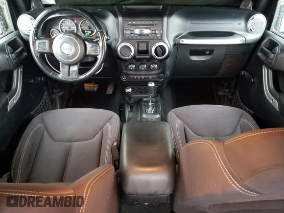 2013 Jeep Wrangler Rubicon with VIN 1C4BJWCG1DL584611, listed as a Copart auction lot 71536944 with 142,975 mi miles and Salvage title. Bid and sale history available at DreamBid. Image 8.