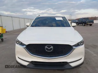 2019 Mazda CX-5 Sport with VIN JM3KFABMXK1655302, listed as a IAAI auction lot 41901293 with 140,369 mi miles and . Bid and sale history available at DreamBid. Image 12.